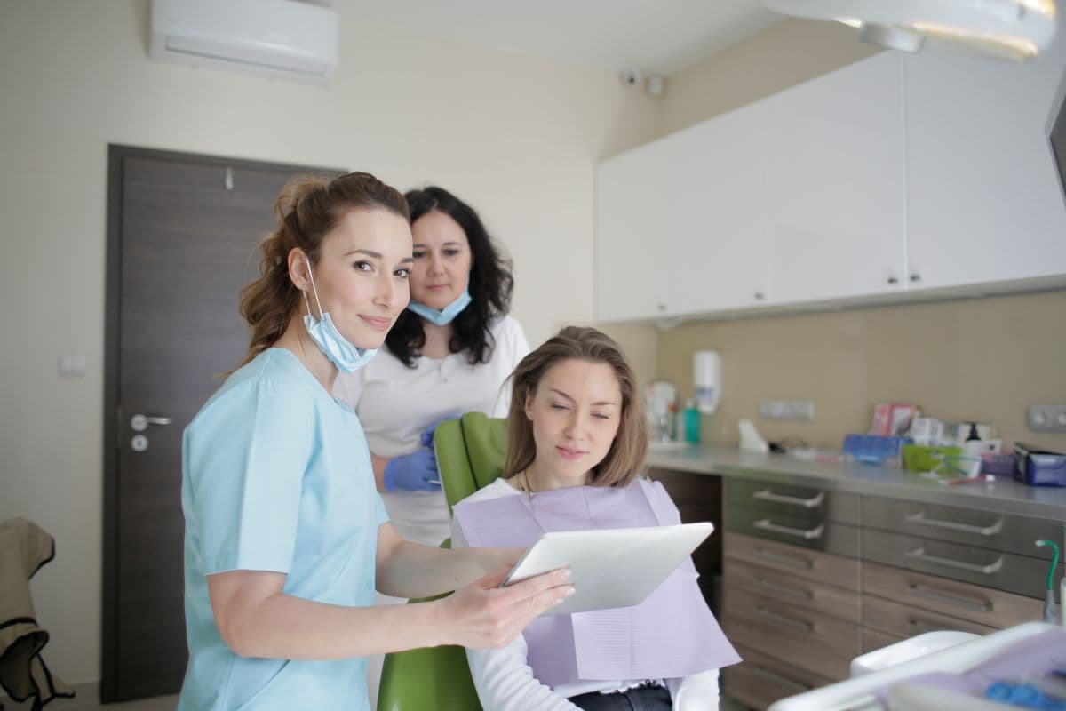 A smiling patient at a friendly consultation